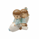 Boy and Girl on Airplane Figurine